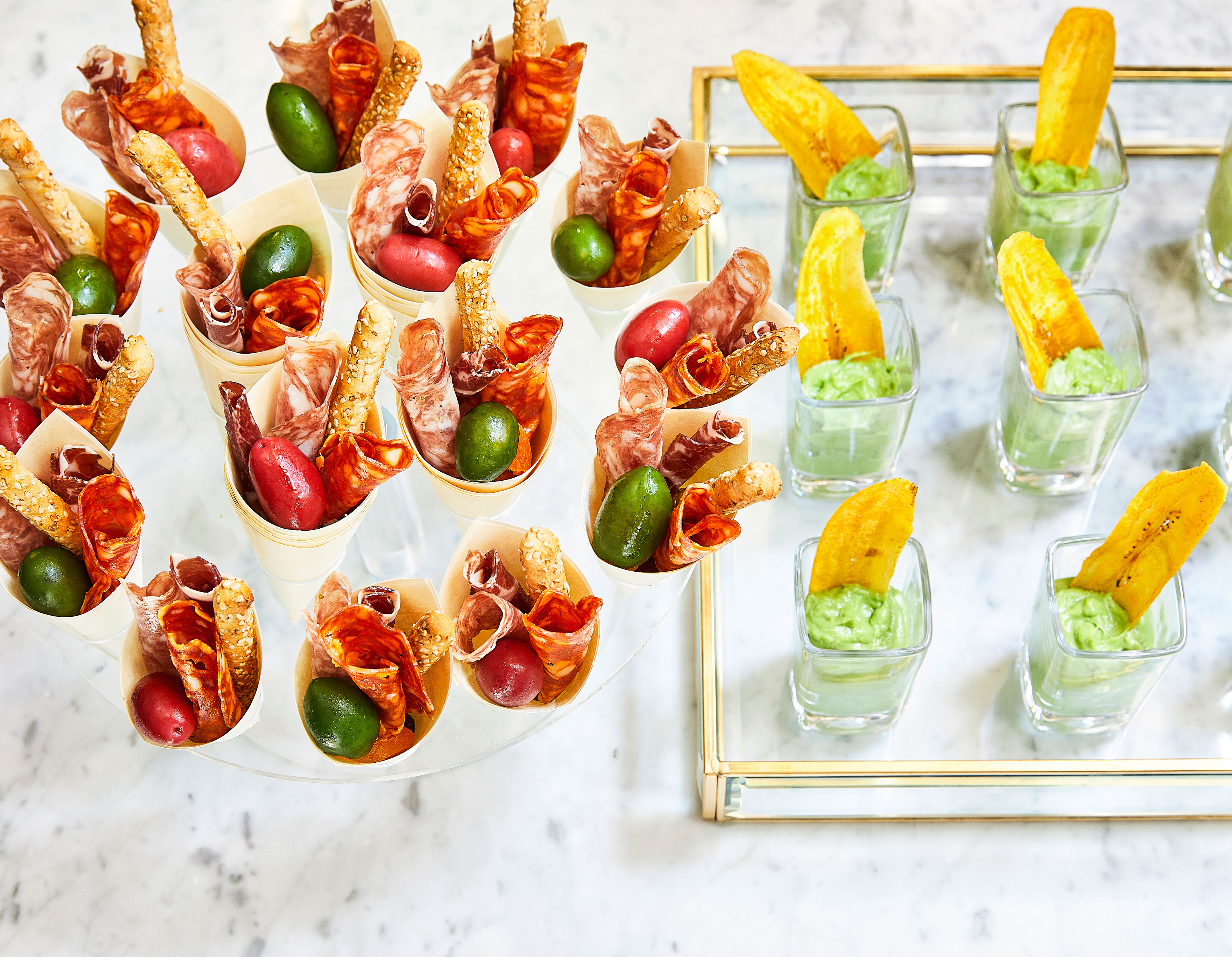 hors d'oeuvres set up on a glass platter