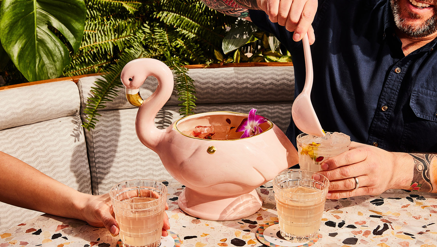 Large-format cocktail in a flamingo pitcher