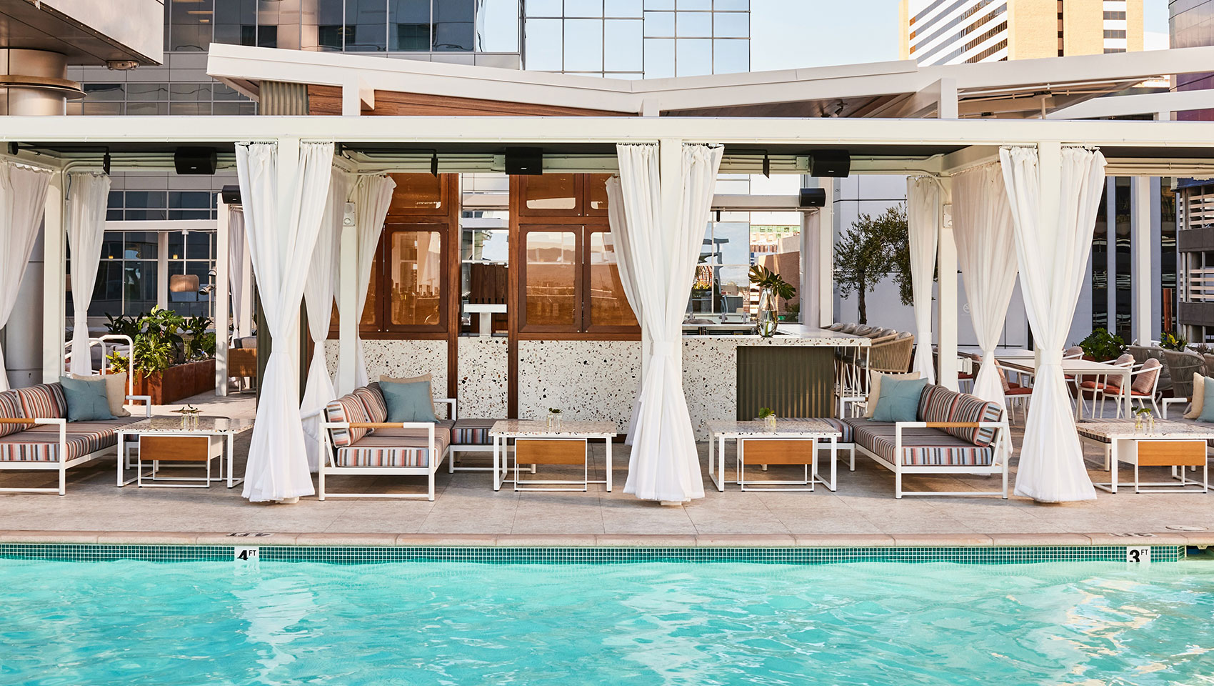 pool with cabanas